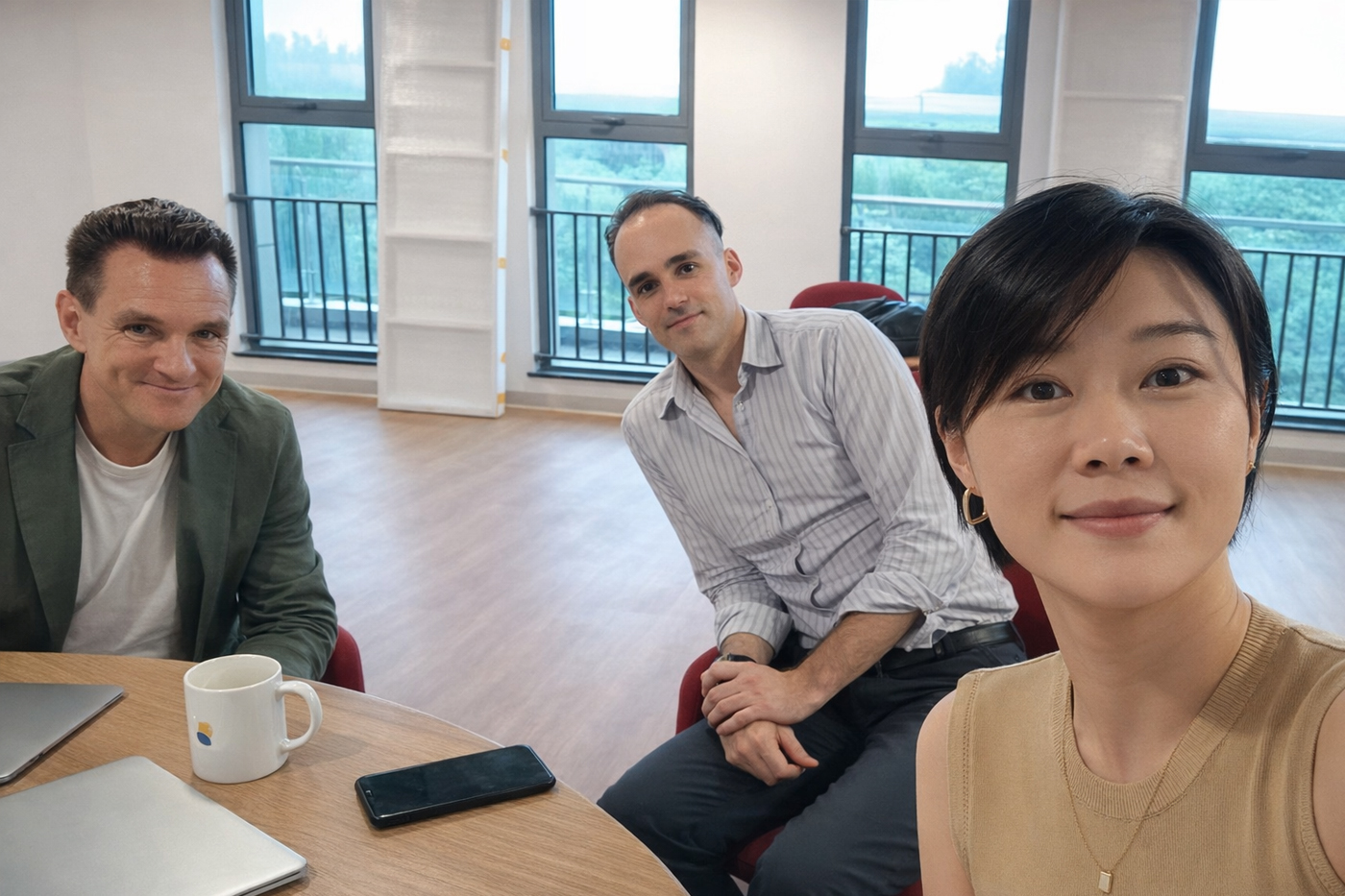 LeWorks founders Erik Forsberg, Rasmus Rasmusson, and Shelley Ye during a team meeting in China